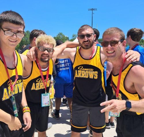 Track athletes gather at athletic event